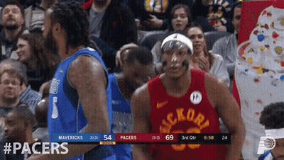 A Basketball Game Between The Pacers And The Mavericks Is Underway GIF