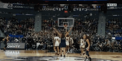 A Basketball Game Between Uconn And The Huskies Is Going On GIF