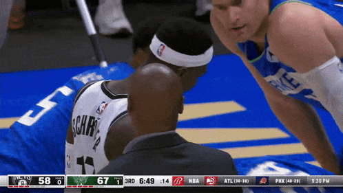 A Basketball Game Is Being Played And The Score Is 58 To 67 GIF