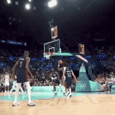 A Basketball Game Is Being Played At The Paris Olympics GIF