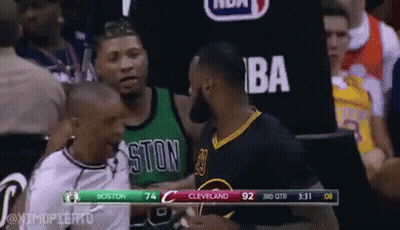 A Basketball Game Is Being Played Between Boston And Cleveland . GIF