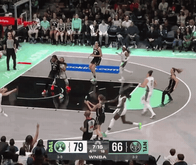 A Basketball Game Is Being Played Between The Dal And Nyl Teams GIF