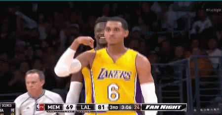 A Basketball Game Is Being Played Between The Lakers And The Mem GIF