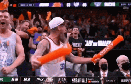 A Basketball Game Is Being Played Between The Suns And The Warriors GIF