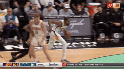 A Basketball Game Is Being Played Between The Suns And The Wizards GIF