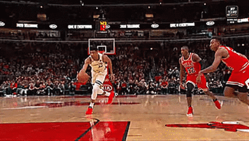 A Basketball Game Is Being Played In A Kia Stadium GIF