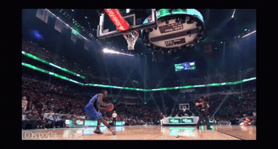 A Basketball Game Is Being Played In A Stadium That Says ' Dawk Ins ' On The Bottom GIF