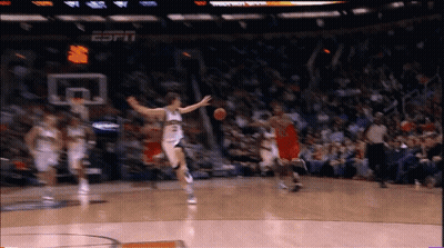 A Basketball Game Is Being Played In A Stadium That Says Espn On It GIF