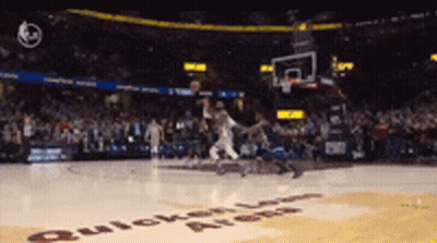 A Basketball Game Is Being Played In A Stadium That Says Quicken Loans On The Floor GIF