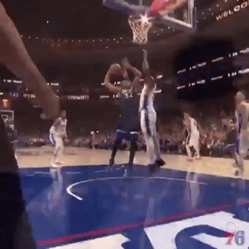 A Basketball Game Is Being Played In A Stadium That Says Welco GIF