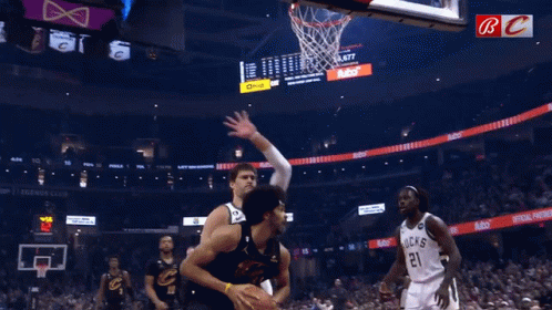 A Basketball Game Is Being Played In A Stadium With A Buck 'S Player On The Court GIF