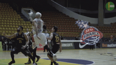 A Basketball Game Is Being Played In A Stadium With A Logo For Sesi France In The Background GIF