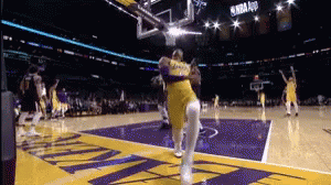A Basketball Game Is Being Played In A Stadium With A Nba Logo GIF