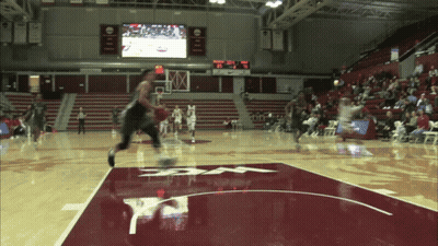 A Basketball Game Is Being Played In A Stadium With A Scoreboard That Says ' Ucsd ' On It GIF