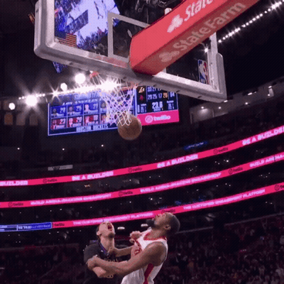 A Basketball Game Is Being Played In A Stadium With A State Farm Banner GIF