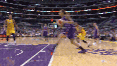 A Basketball Game Is Being Played In A Stadium With Espn On The Wall GIF