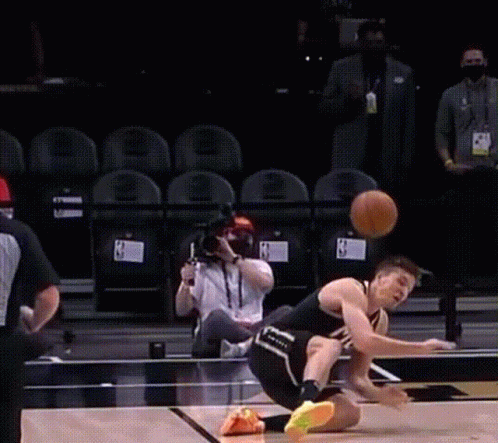 A Basketball Game Is Being Played In A Stadium With The Word Nba On The Bleachers GIF