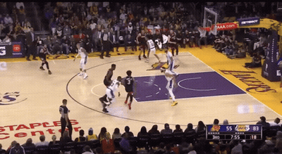 A Basketball Game Is Being Played In A Staples Center GIF