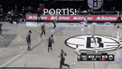 A Basketball Game Is Being Played In Front Of A Banner That Says State Farm GIF