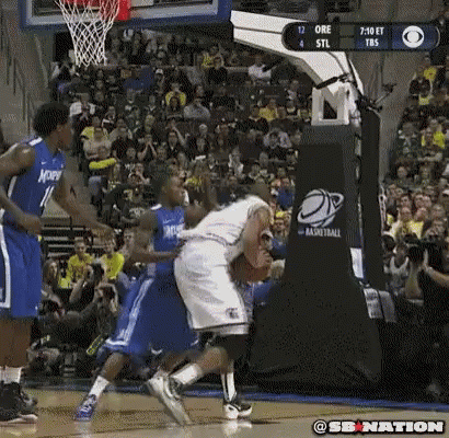 A Basketball Game Is Being Played In Front Of A Crowd And A Scoreboard That Says Sb Nation GIF