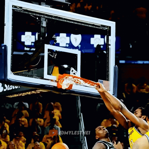 A Basketball Game Is Being Played In Front Of A Crowd And The Hashtag Mylesthei Is On The Bottom Right GIF