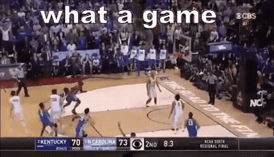 A Basketball Game Is Being Played In Front Of A Crowd And The Words What A Game Are On The Screen . GIF