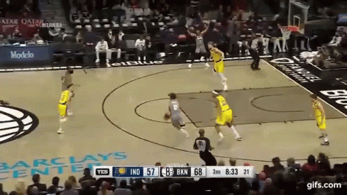 A Basketball Game Is Being Played In Front Of A Crowd At The Barclays Center GIF