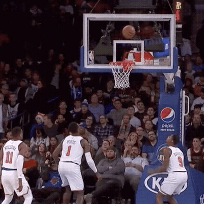 A Basketball Game Is Being Played In Front Of A Crowd Of People Sponsored By Pepsi GIF