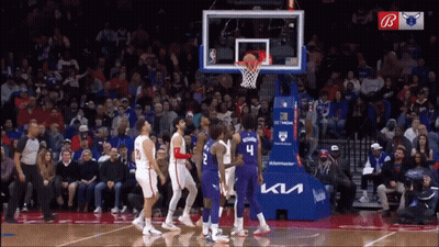 A Basketball Game Is Being Played In Front Of A Crowd Sponsored By Ktl GIF