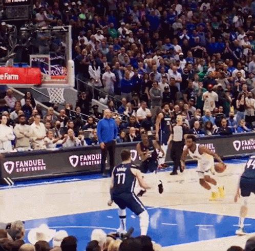 A Basketball Game Is Being Played In Front Of A Crowd With A Banner For Fanduel Sportsbook GIF