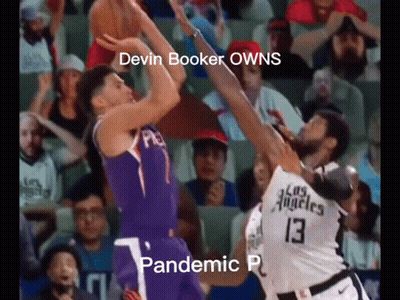 A Basketball Game Is Being Played In Front Of A Crowd With A Caption That Says Devin Booker Owns Pandemic P . GIF