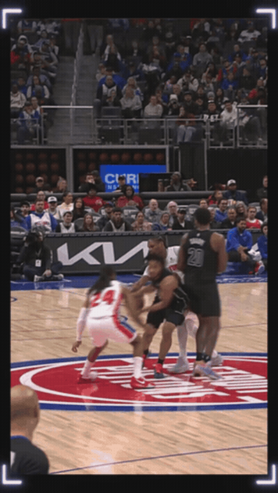 A Basketball Game Is Being Played In Front Of A Crowd With A Kia Ad GIF