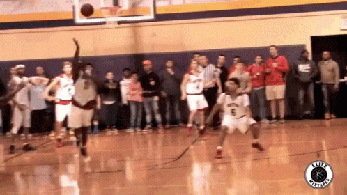 A Basketball Game Is Being Played In Front Of A Crowd With A Logo For Elite Basketball GIF