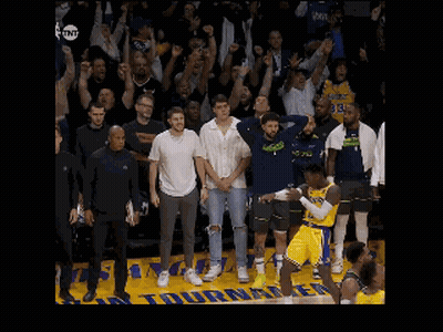 A Basketball Game Is Being Played In Front Of A Crowd With A Tnt Logo GIF