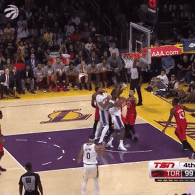 A Basketball Game Is Being Played In Front Of A Crowd With A Tsn Sign In The Background GIF