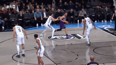 A Basketball Game Is Being Played In Front Of A Crowd With Nba Tnt Written On The Screen GIF