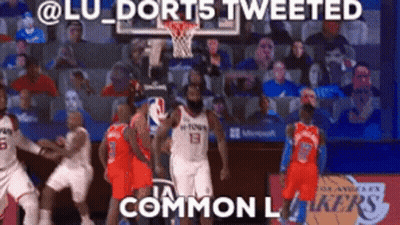 A Basketball Game Is Being Played In Front Of A Crowd With The Caption " Lu Dorts Tweeted Common L Lakers " GIF