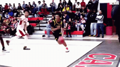 A Basketball Game Is Being Played In Front Of A Crowd With The Word Cal On The Floor GIF