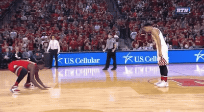 A Basketball Game Is Being Played In Front Of A Crowd With Us Cellular Advertisements GIF