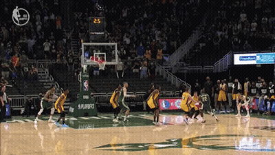 A Basketball Game Is Being Played In Front Of A Frankfurt Welcome Sign GIF
