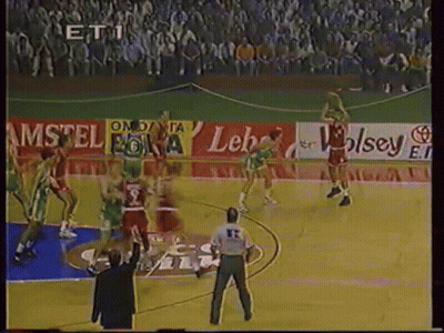A Basketball Game Is Being Played In Front Of A Large Crowd With Ads For Amstel And Wolsey GIF