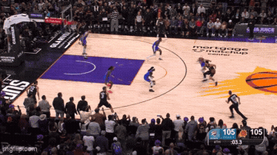 A Basketball Game Is Being Played In Front Of A Mortgage Matchup Center GIF