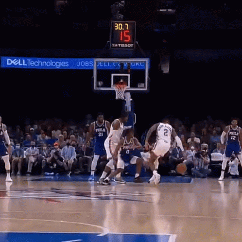 A Basketball Game Is Being Played In Front Of A Sign That Says Dell Technologies GIF
