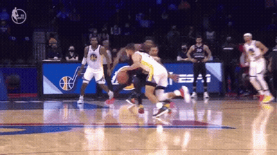 A Basketball Game Is Being Played In Front Of A Sign That Says Espn On It GIF