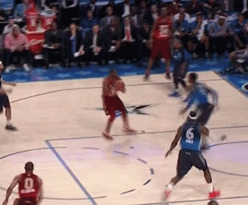 A Basketball Game Is Being Played On A Court And One Of The Players Has The Number 6 On Their Jersey GIF