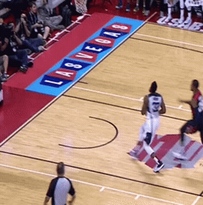 A Basketball Game Is Being Played On A Court Sponsored By Las Vegas GIF