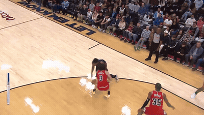 A Basketball Game Is Being Played On A Court Sponsored By Let Em Know GIF