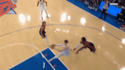 A Basketball Game Is Being Played On A Court Sponsored By Msc GIF
