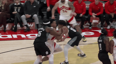 A Basketball Game Is Being Played On A Court That Has The Word Anger On The Floor GIF