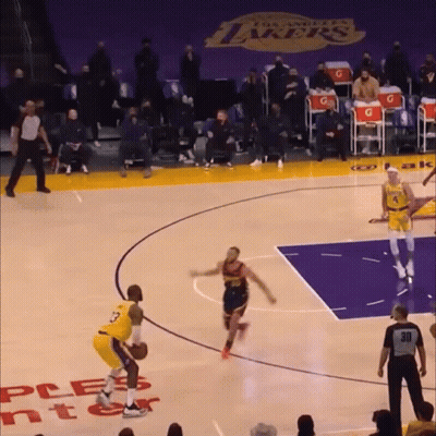 A Basketball Game Is Being Played On A Court That Has The Word Lakers On It GIF